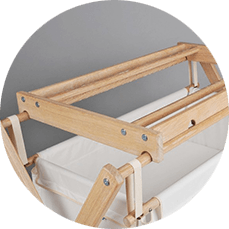 Cradle with wooden superstructure